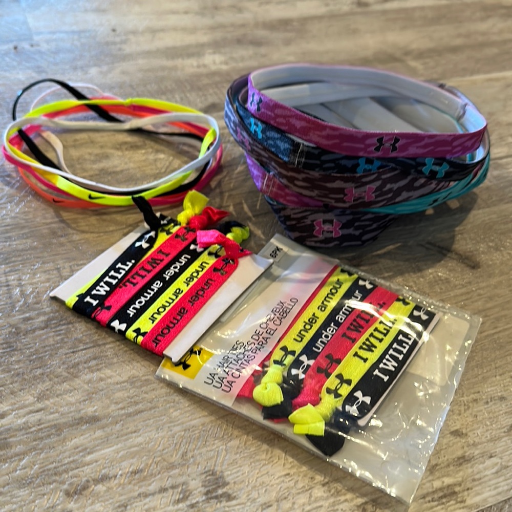 Never worn Nike and Under Armour head bands and hair ties
